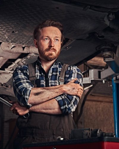 two-bearded-auto-mechanic-working-in-repair-garage-2025-01-26-13-16-38-utc.jpg